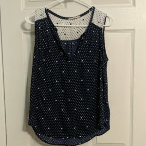 Sleeveless blue and white polkadot top